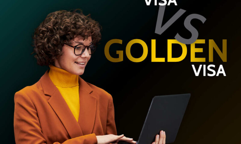 Smiling woman in orange blazer holding a laptop, captioned Freelance Visa vs Golden Visa on a dark gradient background