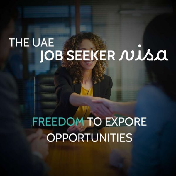 Smiling woman in business attire shaking hands across a boardroom table, captioned the UAE job seeker visa, freedom to explore opportunities