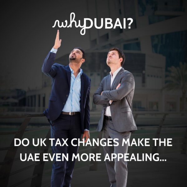 Two businessmen looking up at the sky outside a modern Dubai building, captioned why Dubai, do UK tax changes make the UAE even more appealing
