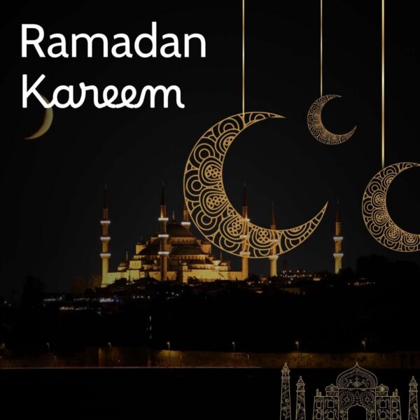 Decorative gold filigree crescent moons over a silhouetted mosque at night, captioned Ramadan Kareem